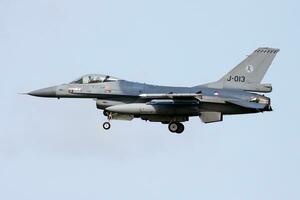 Royal Netherlands Air Force Lockheed Martin F-16AM Fighting Falcon J-013 fighter jet arrival and landing at Leeuwarden Air Base for Frisian Flag 2015 Air Exercise photo