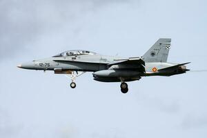 Spanish Air Force McDonnell Douglas EF-18B Hornet CE15-12 fighter jet arrival and landing at Leeuwarden Air Base for Frisian Flag 2015 Air Exercise photo