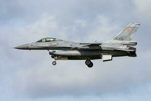 Polish Air Force Lockheed Martin F-16C Fighting Falcon 4066 fighter jet arrival and landing at Leeuwarden Air Base for Frisian Flag 2015 Air Exercise photo