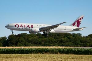 Qatar Airways Cargo Boeing 777-200 A7-BFL cargo plane arrival and landing at Luxembourg Findel airport photo