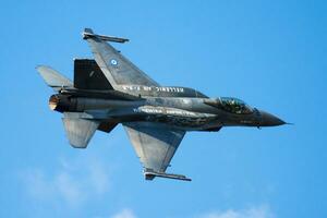 Military fighter jet plane at air base. Air force flight operation. Aviation and aircraft. Air defense. Military industry. Fly and flying. photo