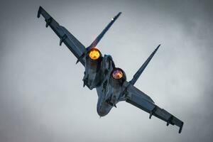 Military fighter jet plane at air base. Air force flight operation. Aviation and aircraft. Air defense. Military industry. Fly and flying. photo