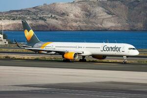 Condor Airlines passenger plane at airport. Schedule flight travel. Aviation and aircraft. Air transport. Global international transportation. Fly and flying. photo