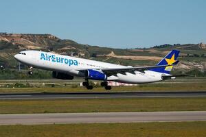 Air Europa passenger plane at airport. Schedule flight travel. Aviation and aircraft. Air transport. Global international transportation. Fly and flying. photo