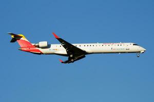 Iberia Regional Air Nostrum Bombardier CRJ-900 EC-JNB passenger plane landing at Madrid Barajas Airport photo