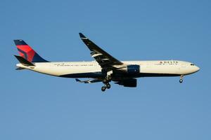 Delta Airlines Airbus A330-300 N822NW passenger plane landing at Madrid Barajas Airport photo