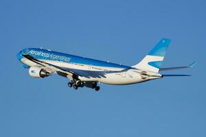 Aerolineas Argentinas passenger plane at airport. Schedule flight travel. Aviation and aircraft. Air transport. Global international transportation. Fly and flying. photo