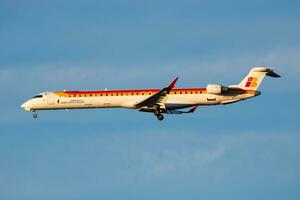 Iberia Airlines passenger plane at airport. Schedule flight travel. Aviation and aircraft. Air transport. Global international transportation. Fly and flying. photo