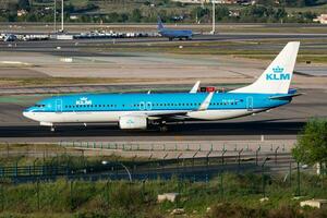 KLM passenger plane at airport. Schedule flight travel. Aviation and aircraft. Air transport. Global international transportation. Fly and flying. photo