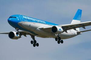 Aerolineas Argentinas passenger plane at airport. Schedule flight travel. Aviation and aircraft. Air transport. Global international transportation. Fly and flying. photo