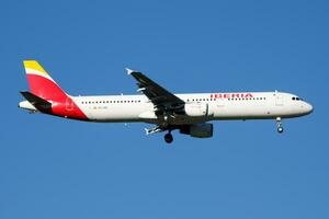 Iberia Airlines Airbus A321 EC-IXD passenger plane landing at Madrid Barajas Airport photo