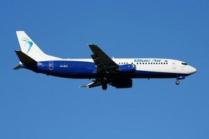 Blue Air Boeing 737-400 YR-BAZ passenger plane landing at Madrid Barajas Airport photo