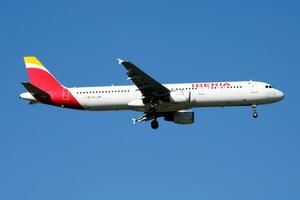 Iberia Airlines Airbus A321 EC-JZM passenger plane landing at Madrid Barajas Airport photo