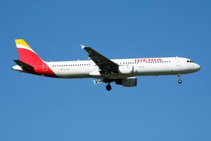 Iberia Airlines Airbus A321 EC-IJN passenger plane landing at Madrid Barajas Airport photo