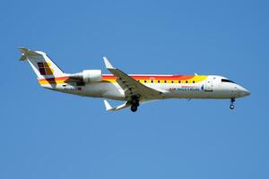 Iberia Regional Air Nostrum Bombardier CRJ-200 EC-GZA passenger plane landing at Madrid Barajas Airport photo