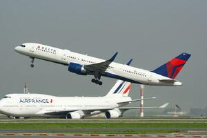 Delta Airlines Boeing 757-200 N712TW passenger plane departure and take off at Paris Charles de Gaulle Airport photo