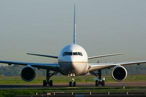 United Airlines Boeing 767-300 passenger plane arrival and landing at Paris Charles de Gaulle Airport photo