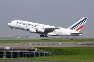 Air France Airbus A380 F-HPJH passenger plane departure and take off at Paris Charles de Gaulle Airport photo