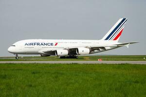Air France Airbus A380 F-HPJE passenger plane departure and take off at Paris Charles de Gaulle Airport photo
