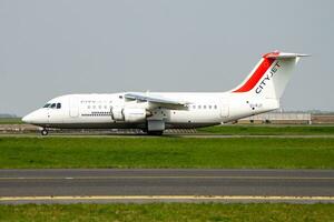 CityJet BAe Avro RJ185 EI-RJY passenger plane departure and take off at Paris Charles de Gaulle Airport photo