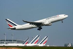 Air France passenger plane at airport. Schedule flight travel. Aviation and aircraft. Air transport. Global international transportation. Fly and flying. photo