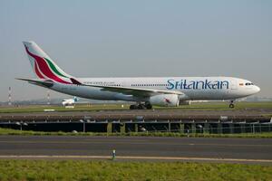 SriLankan Airlines Airbus A330-200 4R-ALB passenger plane arrival and landing at Paris Charles de Gaulle Airport photo