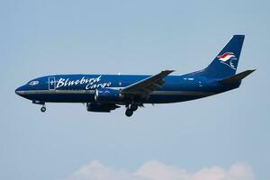 Bluebird Nordic cargo plane at airport. Air freight and shipping. Aviation and aircraft. Transport industry. Global international transportation. Fly and flying. photo