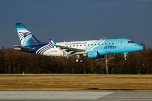 Egyptair Express passenger plane at airport. Schedule flight travel. Aviation and aircraft. Air transport. Global international transportation. Fly and flying. photo