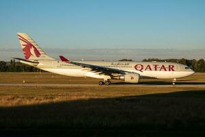 Qatar Airways Airbus A330-200 A7-ACI passenger plane departure and take off at Budapest Airport photo