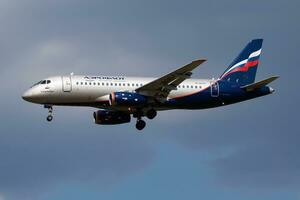 Aeroflot Sukhoi Superjet SSJ RA-89041 passenger plane arrival and landing at Budapest Airport photo