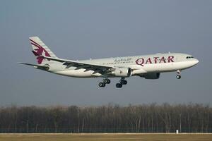 Qatar Airways Airbus A330-200 A7-ACK passenger plane arrival and landing Budapest Airport photo