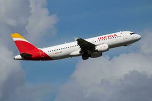 Iberia Airlines Airbus A320 EC-IEF passenger plane departure and take off at Budapest Airport photo