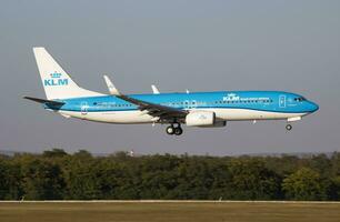 KLM Royal Dutch Airlines Boeing 737-800 PH-HSE passenger plane arrival and landing at Budapest Airport photo