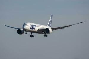 LOT Polish Airlines Boeing 787-8 Dreamliner SP-LRC passenger plane arrival and landing at Budapest Airport photo
