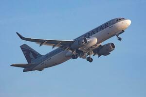 Qatar Airways Airbus A320 A7-AHR passenger plane departure and take off at Budapest Airport photo