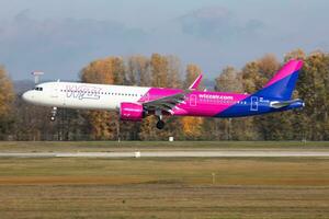 Wizz Air Airbus A321 NEO HA-LVA passenger plane arrival and landing at Budapest Airport photo