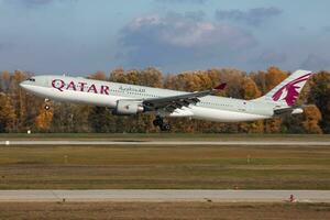 Qatar Airways Airbus A330-300 A7-AEA passenger plane arrival and landing at Budapest Airport photo