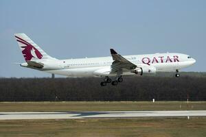 Qatar Airways Airbus A330-200 A7-ACM passenger plane arrival and landing at Budapest Airport photo