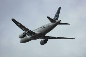 Star Alliance Lufthansa Airbus A319 D-AIBJ passenger plane departure and take off at Budapest Airport photo