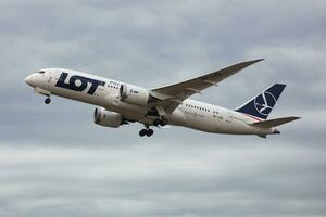 LOT Polish Airlines Boeing 787-8 Dreamliner SP-LRG passenger plane departure and take off at Budapest Airport photo