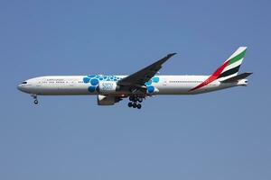 Emirates Airlines special livery Boeing 777-300ER A6-EPD passenger plane arrival and landing at Budapest Airport photo