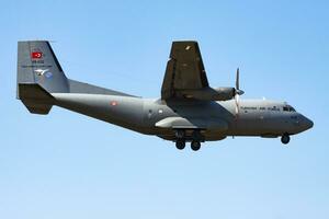 Military transport plane at air base. Air force flight operation. Aviation and aircraft. Air defense. Military industry. Fly and flying. photo