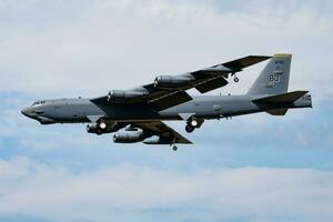 B-52 Military bomber jet plane at air base. Strategic air force flight operation. Aviation and aircraft. Air defense. Military industry. Fly and flying. photo