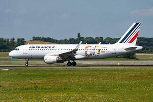 Air France passenger plane at airport. Schedule flight travel. Aviation and aircraft. Air transport. Global international transportation. Fly and flying. photo