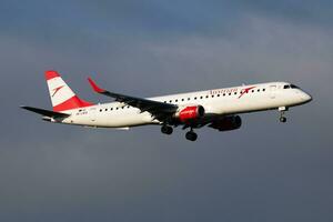 Austrian Airlines Embraer ERJ-195 OE-LWO passenger plane departure and take off at Vienna Airport photo