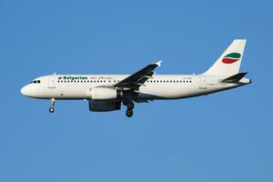 Bulgarian Air Charter Airbus A320 LZ-LAD passenger plane arrival and landing at Vienna Airport photo