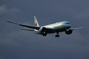 Air Canada Boeing 787-9 Dreamliner C-FGEO passenger plane arrival and landing at Vienna International Airport photo