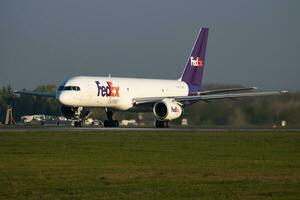 FedEx Boeing 757-200 N972FD cargo plane departure and take off at Vienna International Airport photo