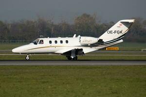 Cessna 525 CitationJet 1 OE-FGK business jet plane departure and take off at Vienna International Airport photo