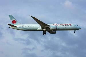 Air Canada Boeing 787-9 Dreamliner C-FGEO passenger plane arrival and landing at Vienna International Airport photo